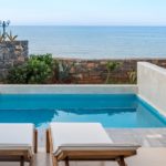 private terrace with a Swim-Up pool including sun loungers & a parasol - outdoor furniture